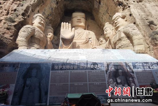 時(shí)下，中國“石窟鼻祖”天梯山石窟第13窟大佛足部與局部危巖體搶救性保護(hù)項(xiàng)目正在施工。圖為施工現(xiàn)場。陳曉斌 攝